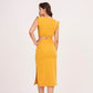 Mustard yellow long skirt with high-waisted design and side slit, made from high-quality muslin fabric. Side cut adds drama and allure. Suitable for dressing up or down.