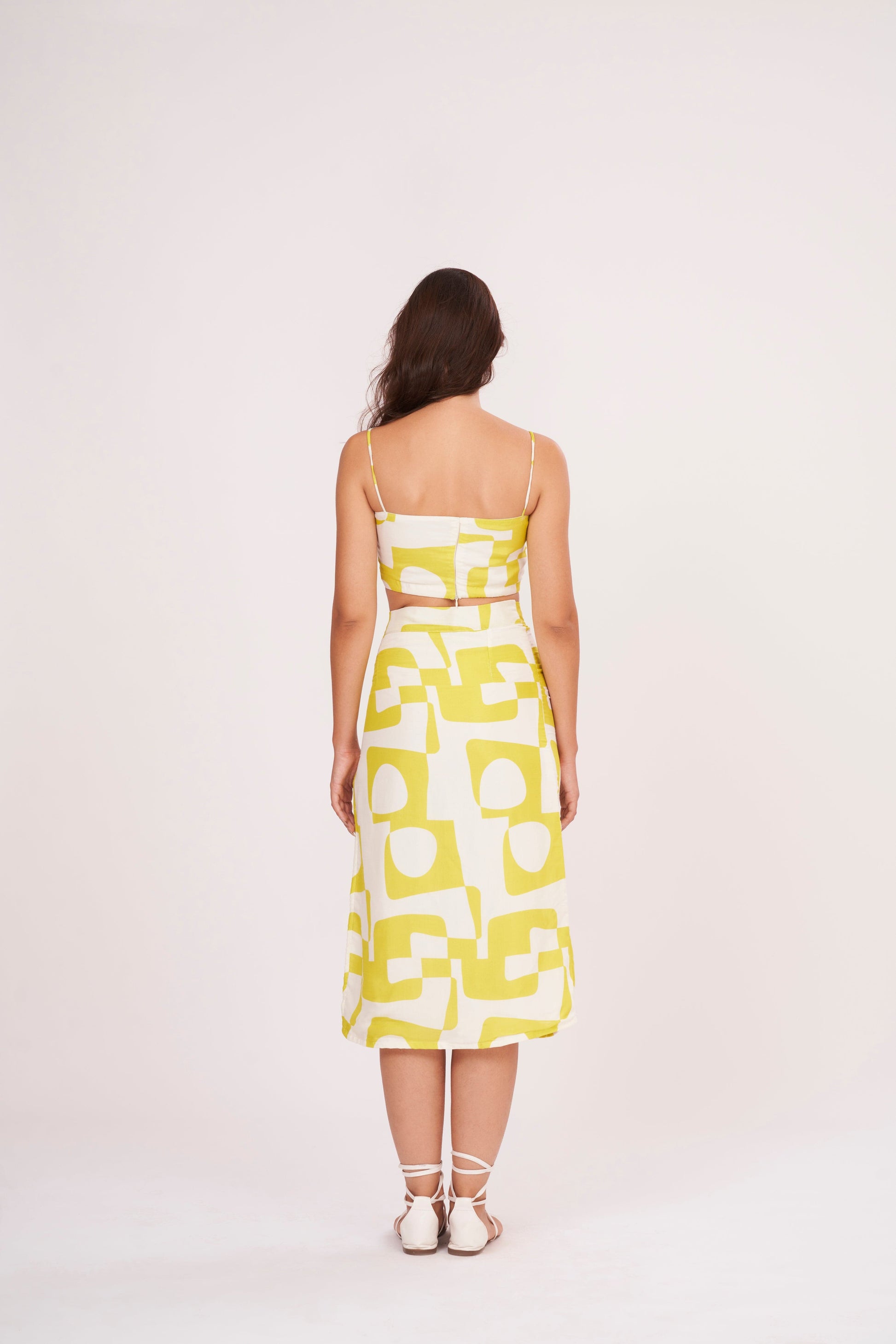 Chic Yellow Printed Strappy Crop Top crafted from lightweight, premium muslin fabric, perfect for summer wardrobe. Versatile