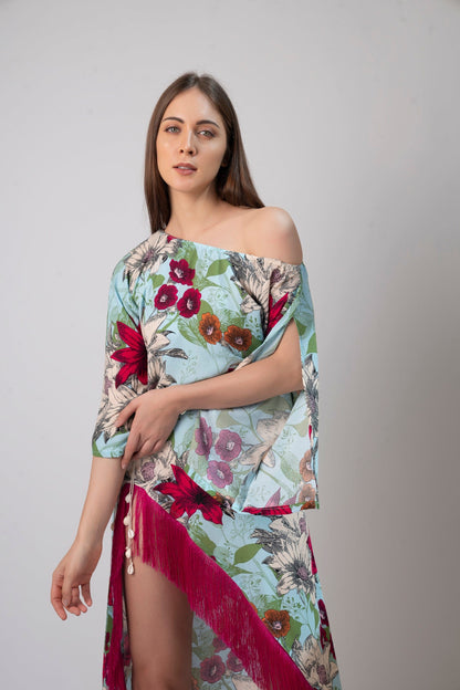 This one-shoulder floral kaftan dress is made of soft and lightweight viscose and is perfect for hot summer days by the beach