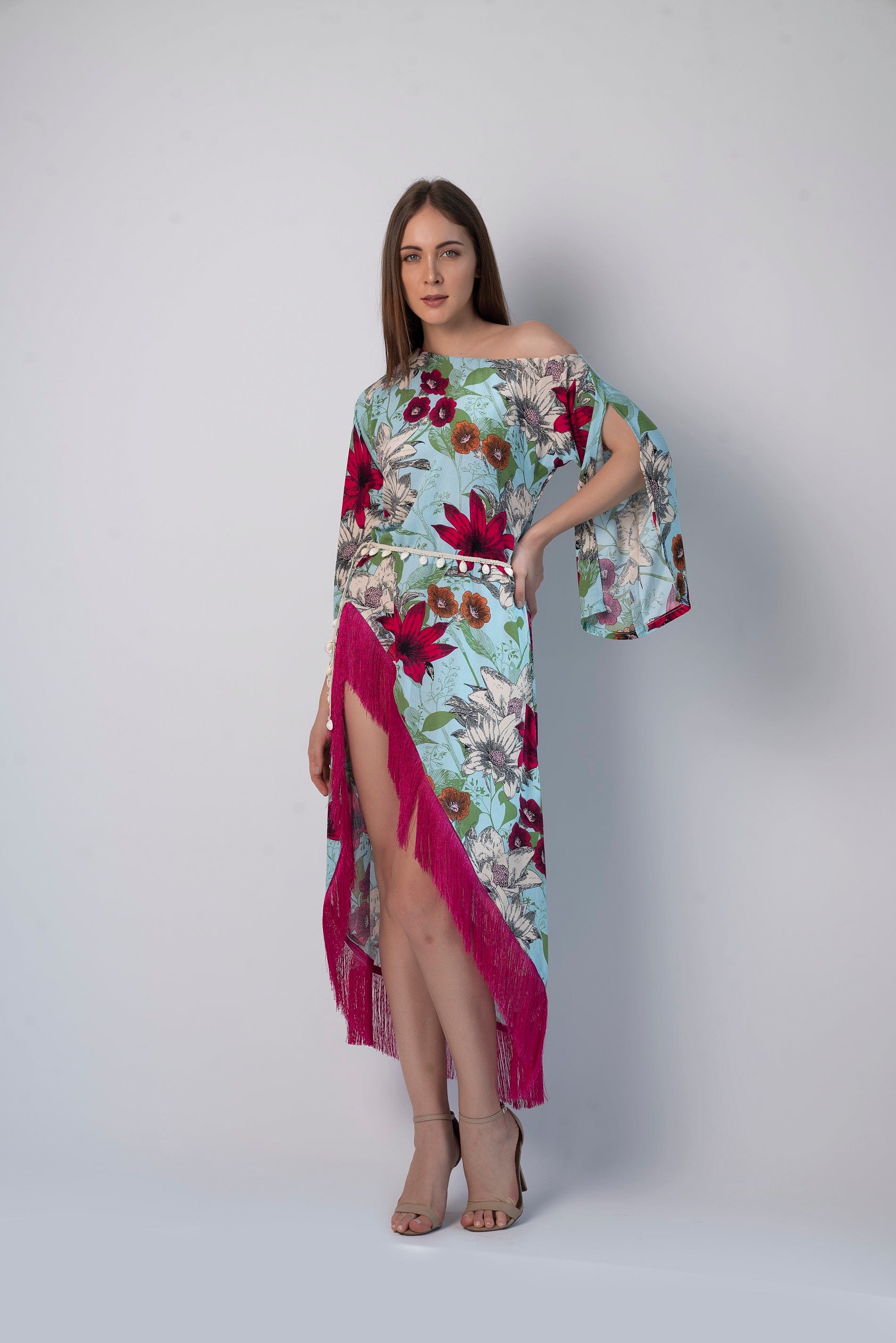 This one-shoulder floral kaftan dress is made of soft and lightweight viscose and is perfect for hot summer days by the beach