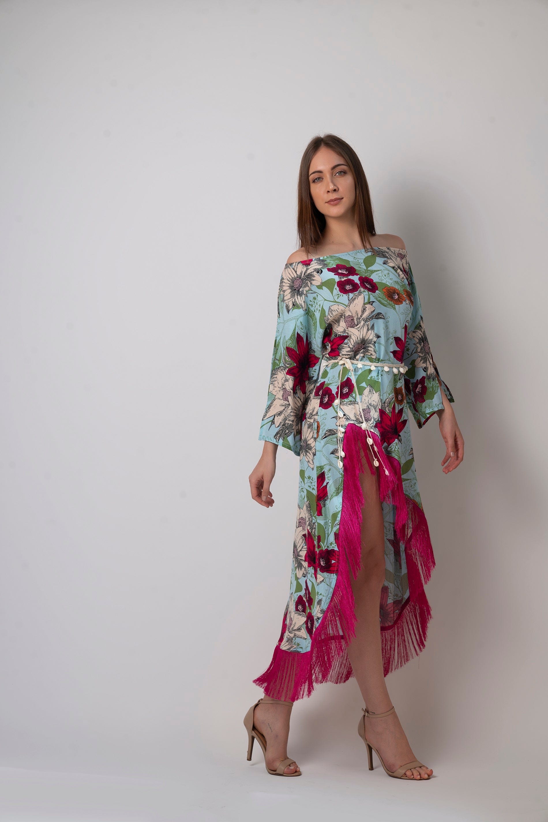 This one-shoulder floral kaftan dress is made of soft and lightweight viscose and is perfect for hot summer days by the beach